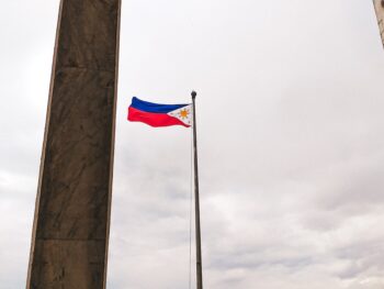 rising flag of Philippines during daytime